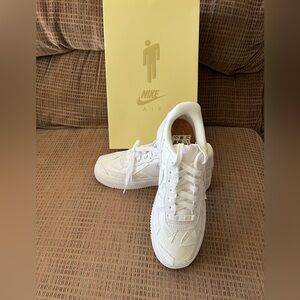 Billie Eillish triple white sneakers